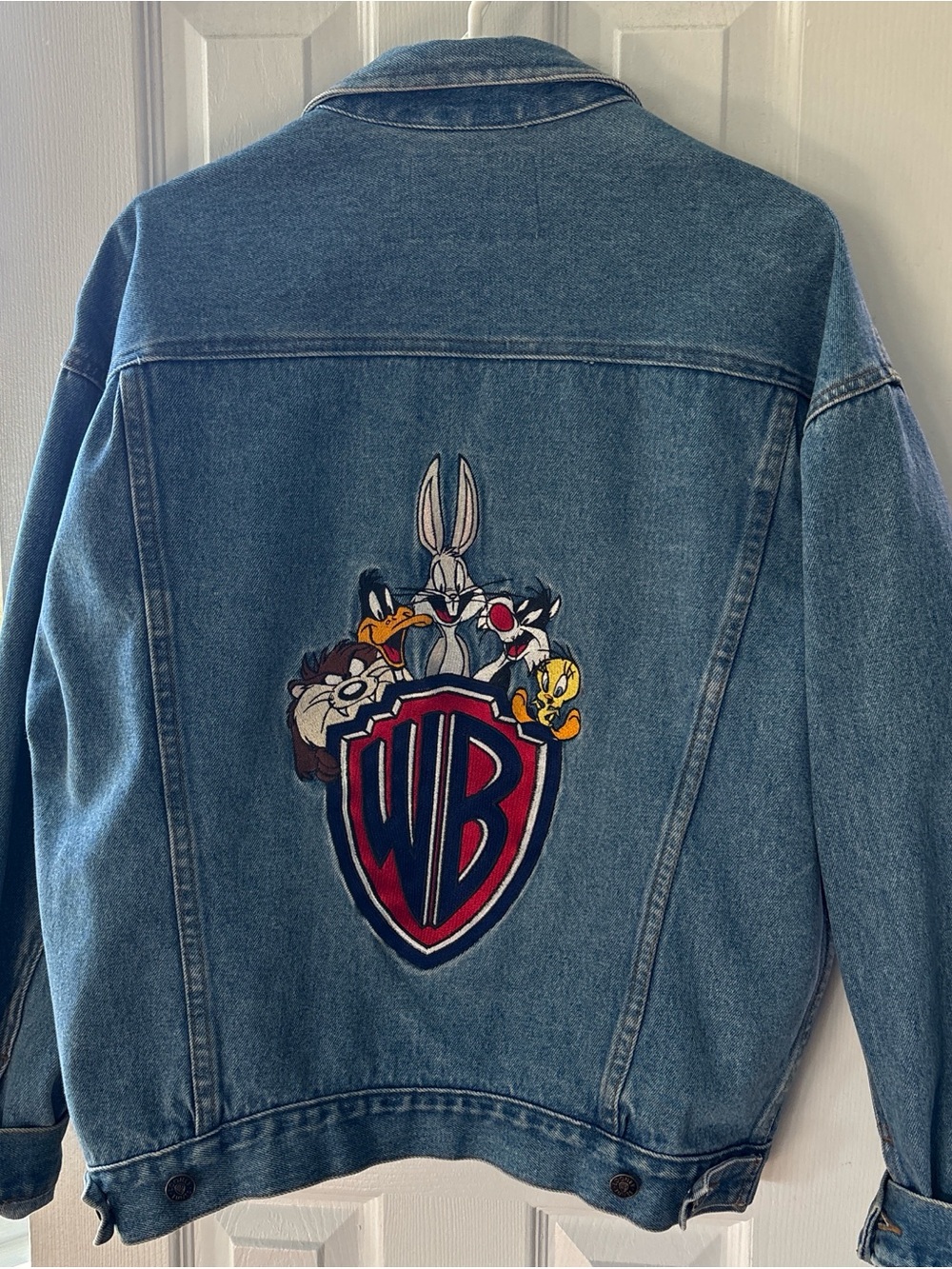 Warner Bros. 1990’s Denim Jacket with Looney Tunes Shield - Blue, Red, Yellow